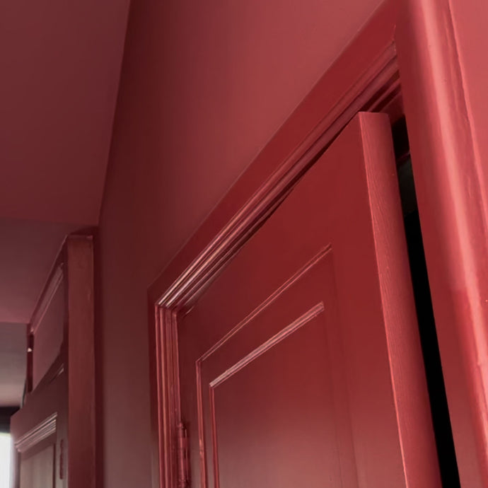 Red painting in the hallway