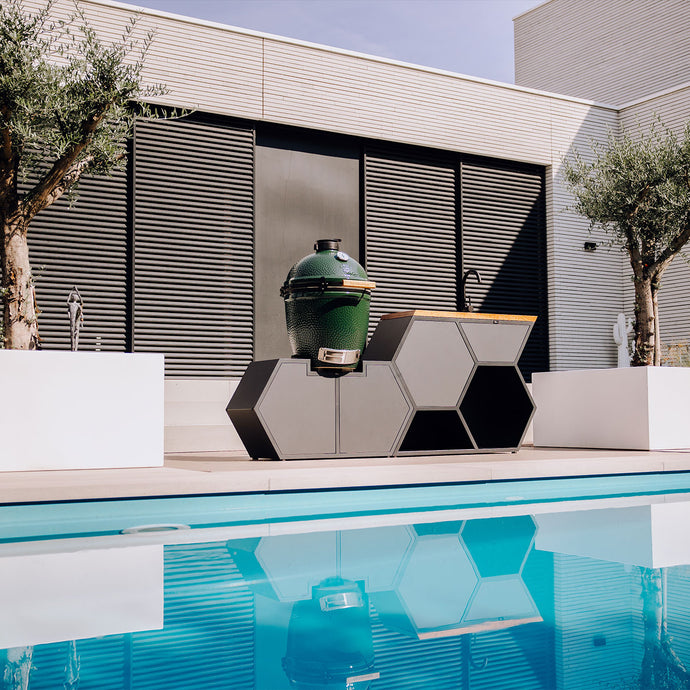 Swimming pool with the 'Less is More' outdoor kitchen from HIVE Kitchens